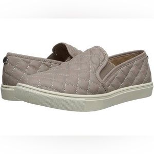 Tan women’s slide on Steve Madden sneakers